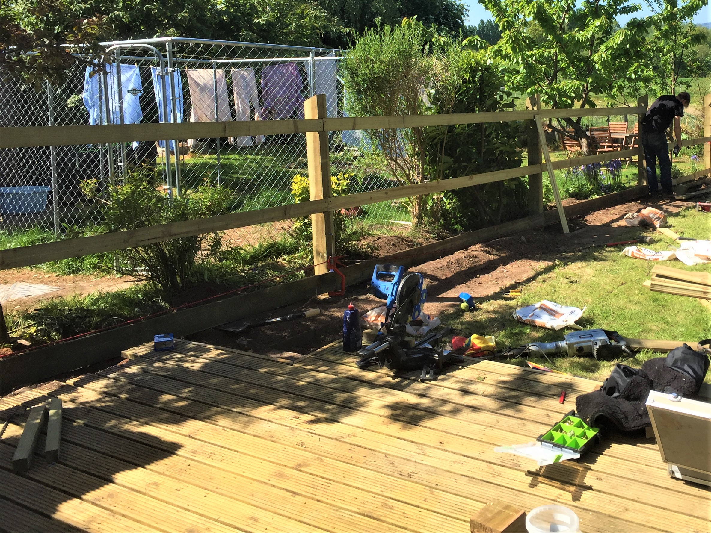Featheredge fence under construction
