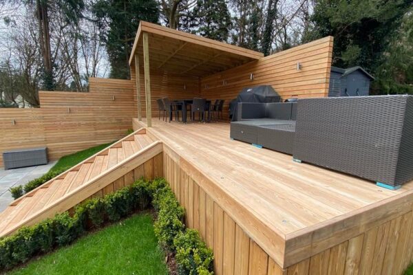 Larch raised deck, fence and covered dining area in Long Ashton, Bristol